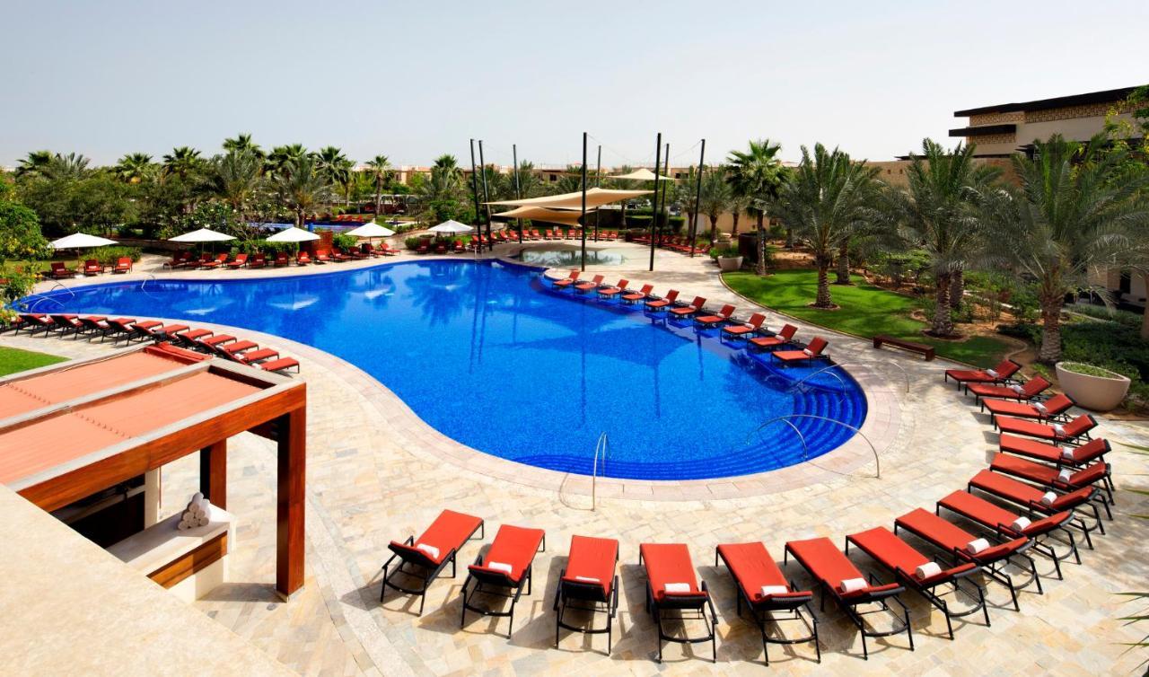 منتجع وسبا ذا ويستن أبو ظبي جولف المظهر الخارجي الصورة The swimming pool at the resort